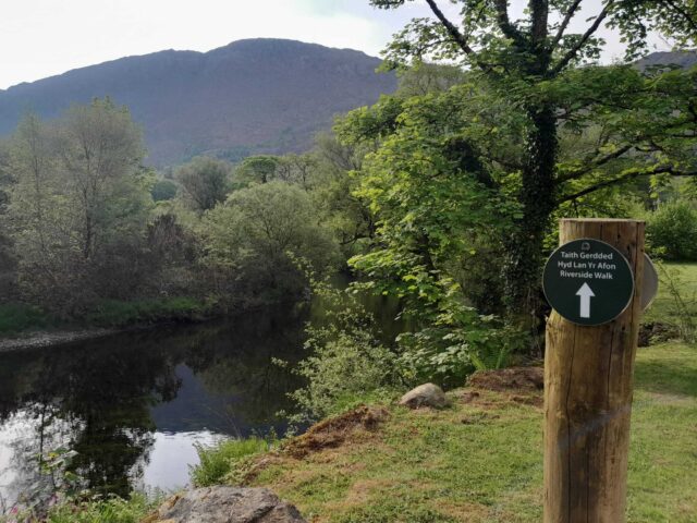 Small sign on post